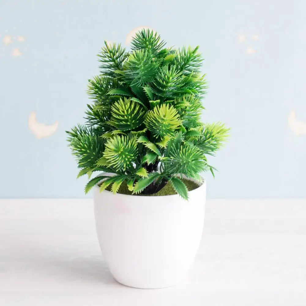 A vibrant green artificial bonsai tree with spiky layered foliage in a white ceramic pot for garden decor