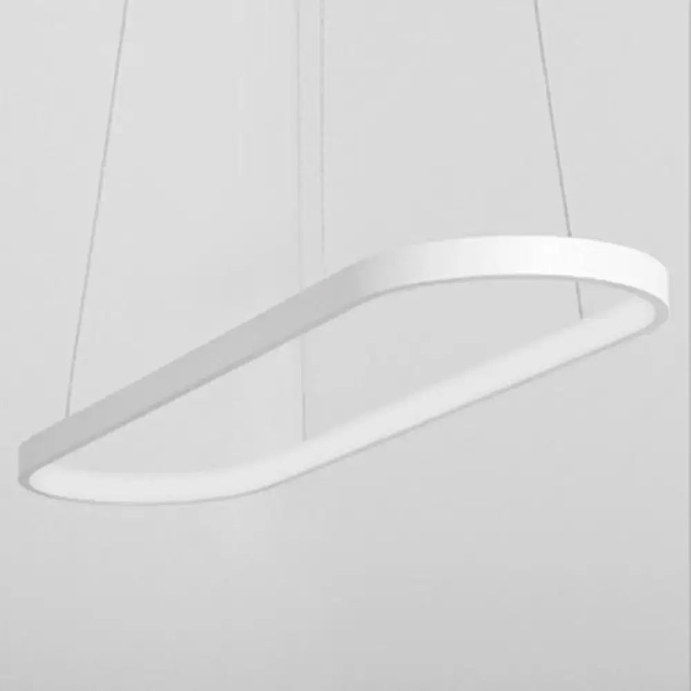 Modern white oval pendant light fixture with artistic metal dining design and sleek minimalist flow shapes by DecorBites