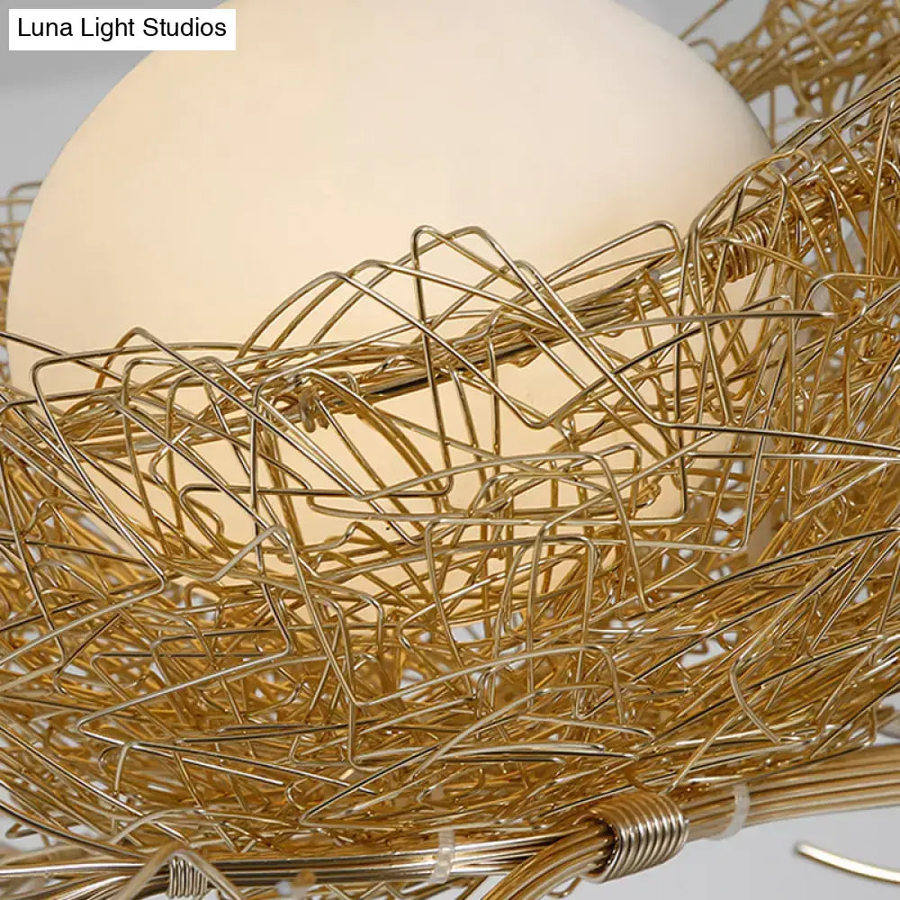 Golden hanging chandelier pendant with artistry milk white glass ball and hand sewn aluminum nest design with birds