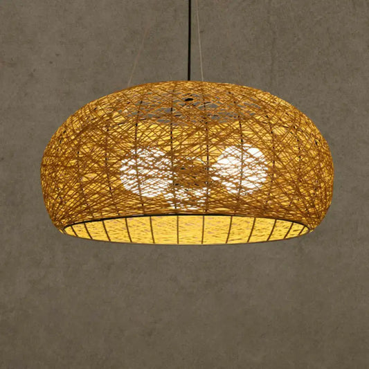 Warm-toned handwoven asian rattan dome pendant light with subtle geometric patterns and e26 e27 bulb base for dining room