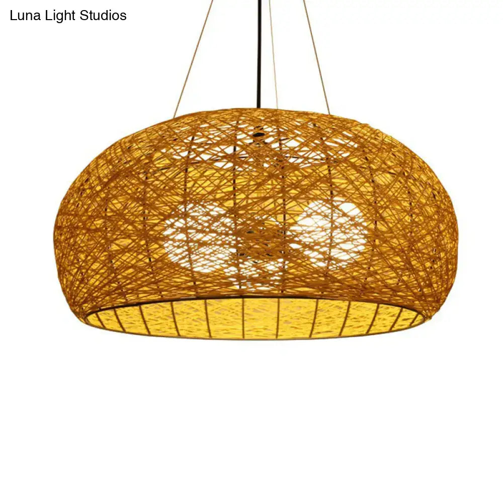 Warm-toned handwoven asian rattan dome pendant light with visible internal lighting and e26 e27 bulb base for dining room