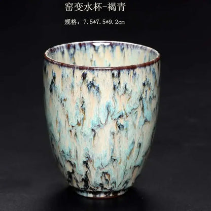 A ceramic kung fu tea cup with mottled teal cream and dark brown crackle glaze from decorbites tea cups set