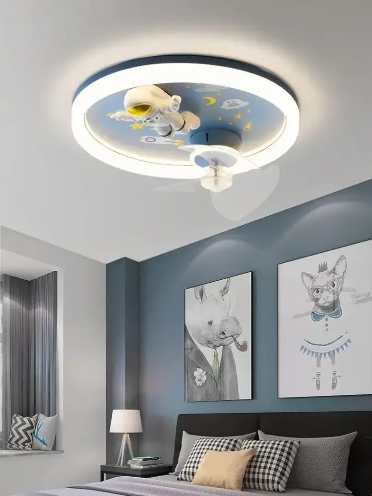 Circular astronaut design ceiling fan light in blue and yellow with a glowing ring for bedroom space fixture