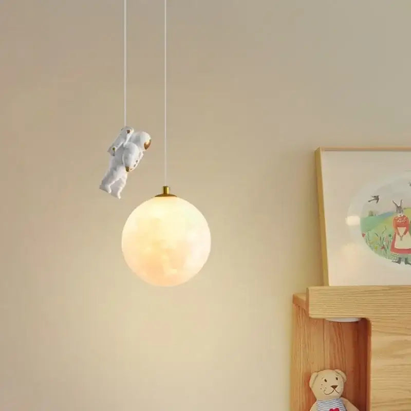 White astronaut moon led pendant light with spherical glowing moon-shaped lampshade for bedroom use
