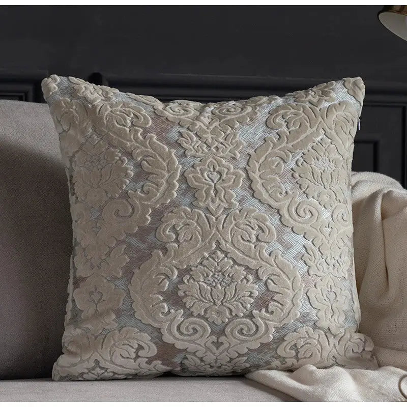 Cream-colored decorbites damask cut velvet cushion cover with intricate raised floral embroidery for living room decor