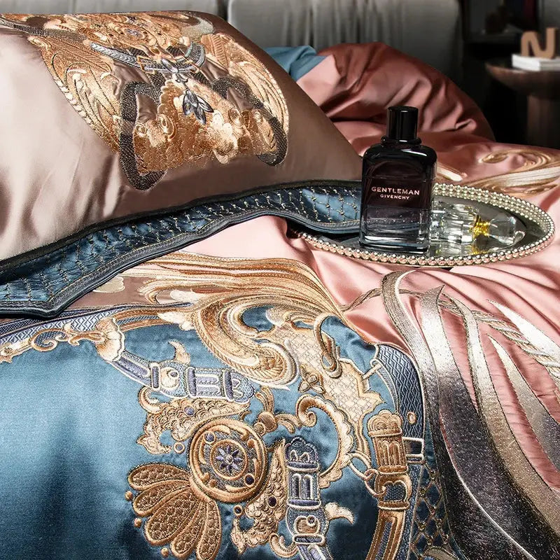 Luxurious baroque rose gold and deep teal satin bedding set with intricate gold and blue embroidery on 1500tc egyptian cotton