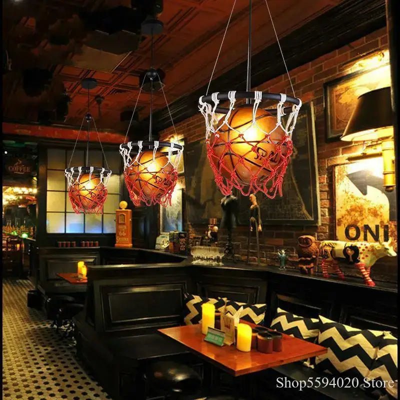 Basketball pendant lights with glowing orange basketballs encased in red netting and black rims for bedroom decorbites basketball pendant