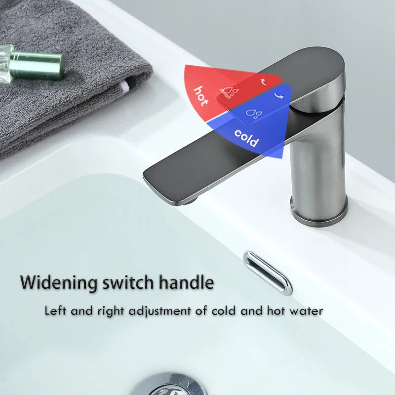 Modern brushed stainless steel bathroom faucet with sleek minimalist design and deck-mounted installation control handle