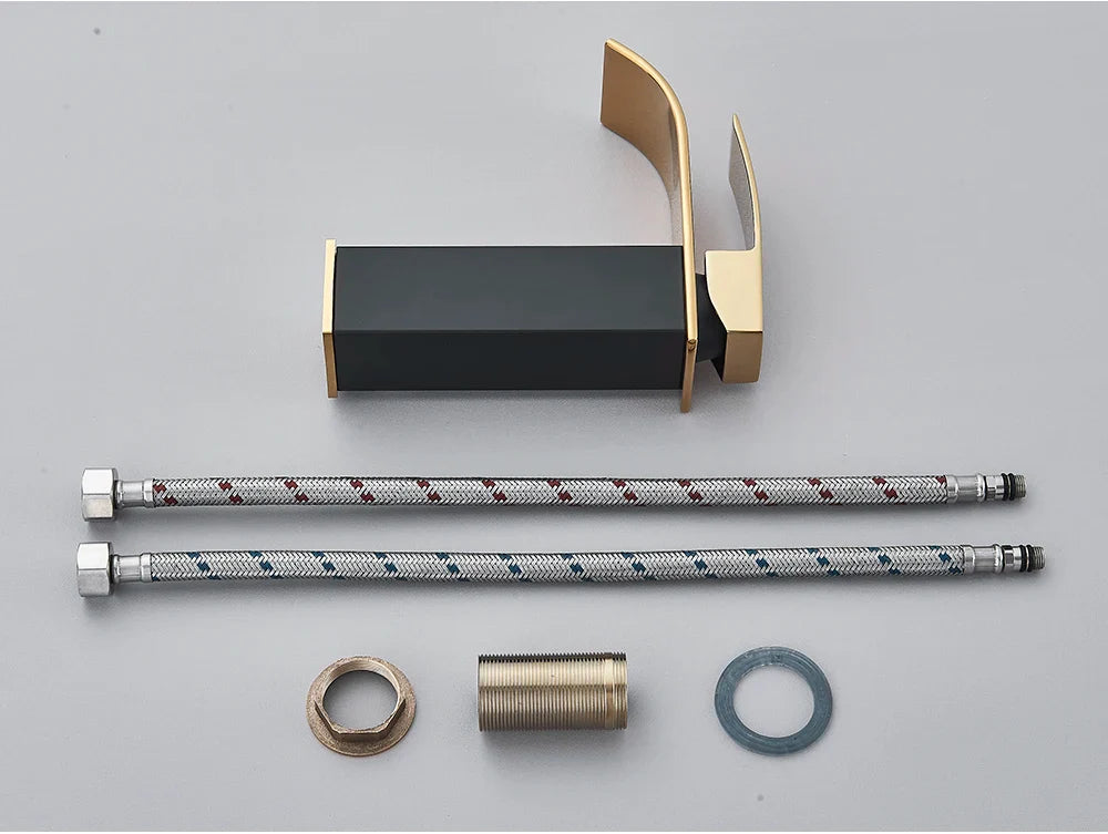 Modern bathroom sink faucet brass deck mount with sleek black and gold finish and stainless steel curved spout design