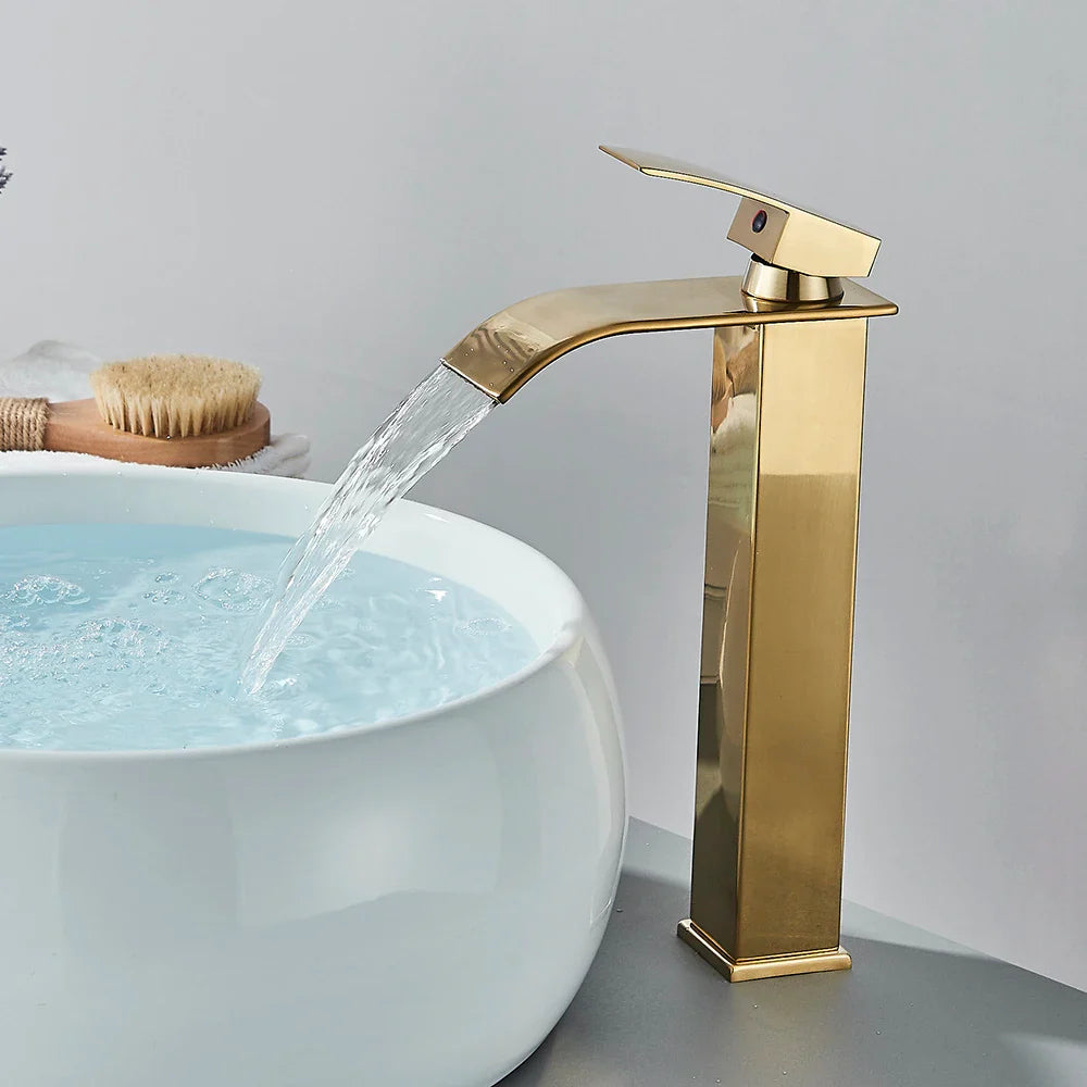 Bathroom sink faucet brass deck mount with gold-toned stainless steel waterfall design and modern brushed finish