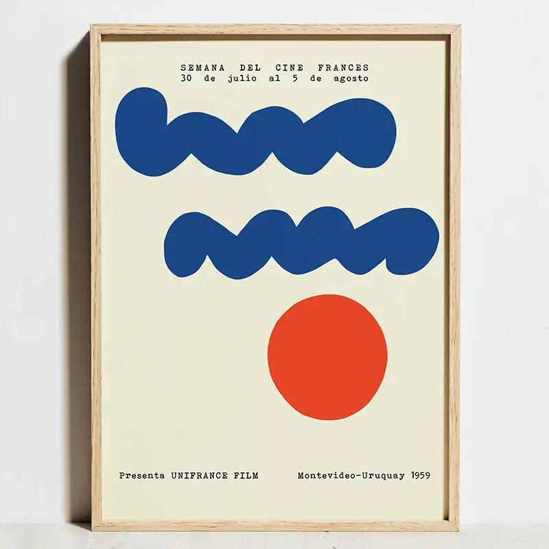 A framed DecorBites™ bauhaus geometric exhibition poster with bold blue waves and a red circle on off-white canvas