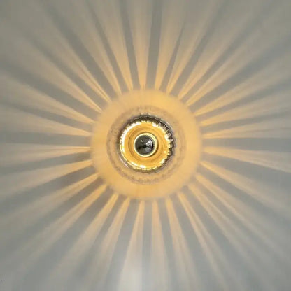Golden bauhaus glass e14 wall lamp with ribbed clear glass sconce and central circular bulb housing for living room