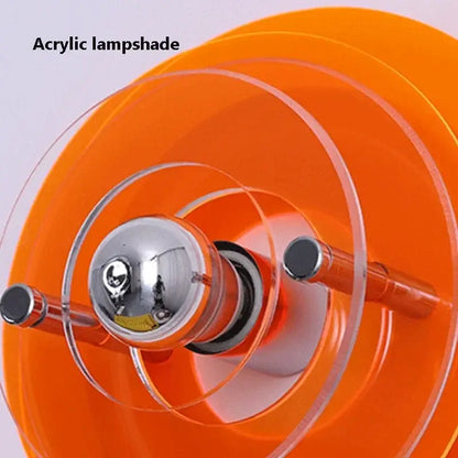 Vibrant orange acrylic lampshade with clear circular rings and chrome bulb holder in bauhaus green and clear glass led wall sconces decorbites led wall