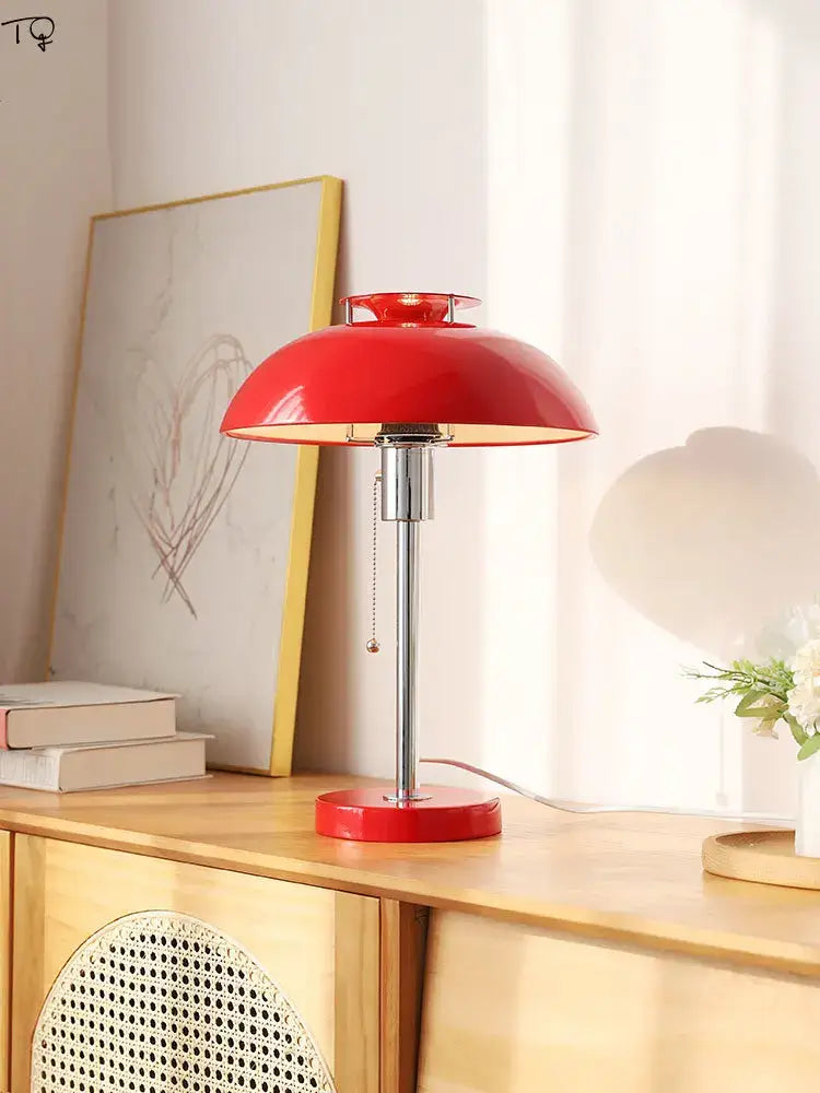 Vibrant red bauhaus led table lamp with glossy finish chrome stem and base ideal for bedroom or living room use