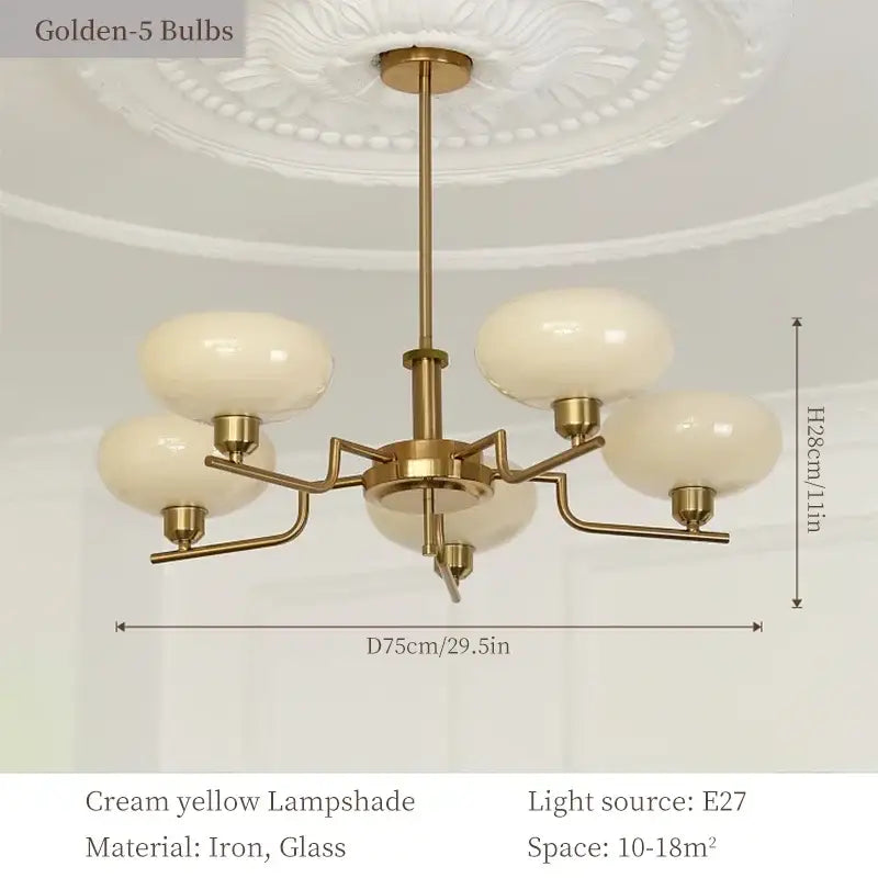 Brass-finished bauhaus medieval chandelier with five cream yellow glass lampshades for living room lighting