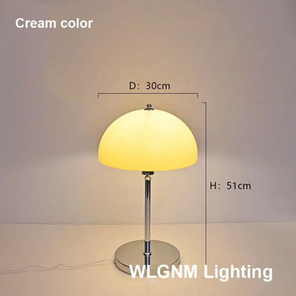Cream-colored bauhaus mushroom table lamp with chrome base and stem for bedroom night light use