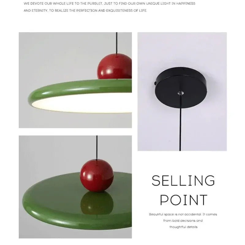 Modern bauhaus saucer chandelier pendant light featuring a glossy red spherical top and matte green circular base for dining room
