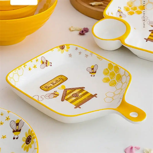 White ceramic bee ceramic plate with yellow honeycomb handle and bee happy design for kitchen use