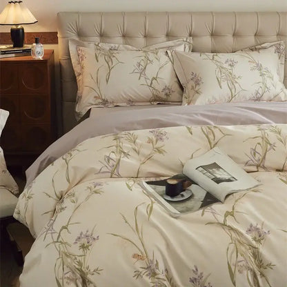 Beige and blush butterfly blooming flowers bedding set with delicate purple and green botanical prints on soft cotton fabric