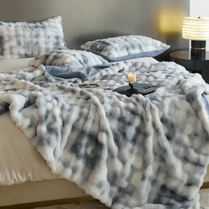 Beige and brown decorbites cozy fleece throw blanket with soft plush faux fur in white and gray gradient pattern