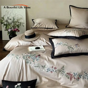 Beige satin bedding set with butterfly flowers embroidery and black piping made from decorbites 1000tc cotton