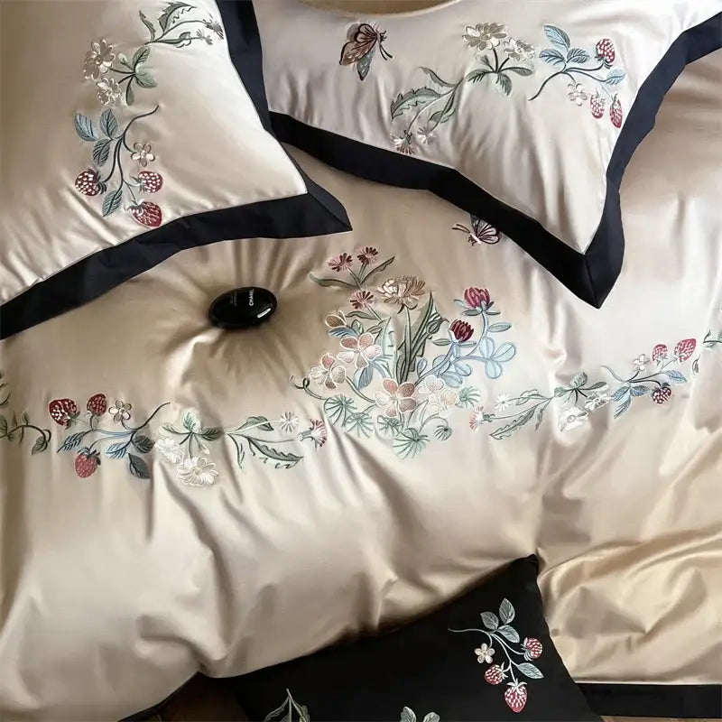 Beige butterfly flowers bedding set in cream satin with strawberry floral embroidery and black piping from decorbites 1000tc cotton