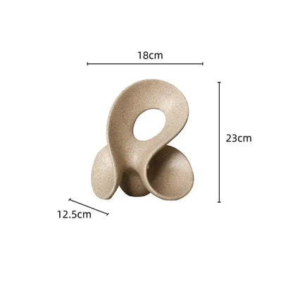 Beige ceramic coral hollow sculpture with flowing organic curves and central oval opening for living room decorbites coral hollow decor