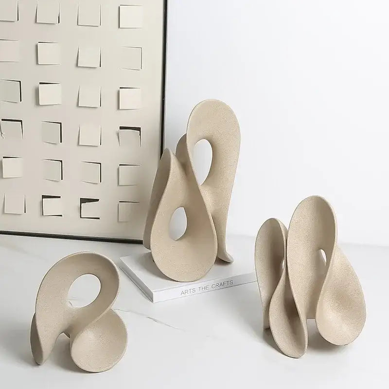 Beige ceramic coral hollow sculpture with flowing intertwined forms for living room abstract decor by decorbites coral hollow