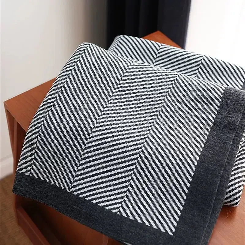 A decorbites cozy striped black and white herringbone knit throw blanket with dark gray border for living room decor