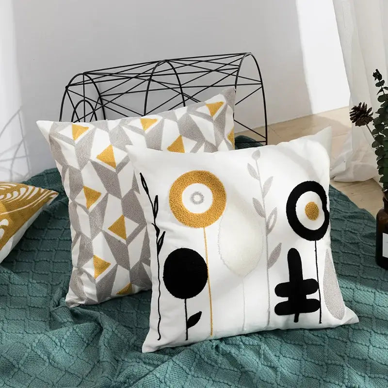 Beige daisy floral geometric pillow cover with white throw pillow and embroidered black gold gray abstract design decorbites daisy floral