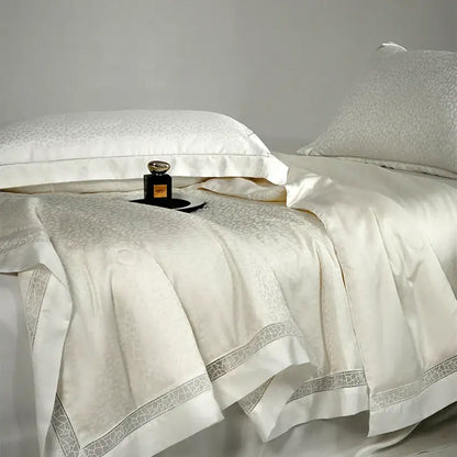 Beige and gold decorbites leopard jacquard summer bedding set with cream satin and silver lace trim features elegant textured pattern