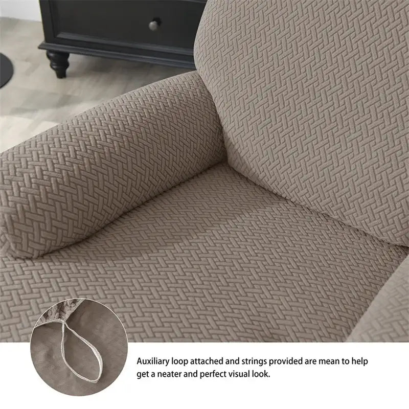 Beige herringbone velvet plush elastic recliner cover with woven texture, reinforced armrests, and built-in auxiliary loop