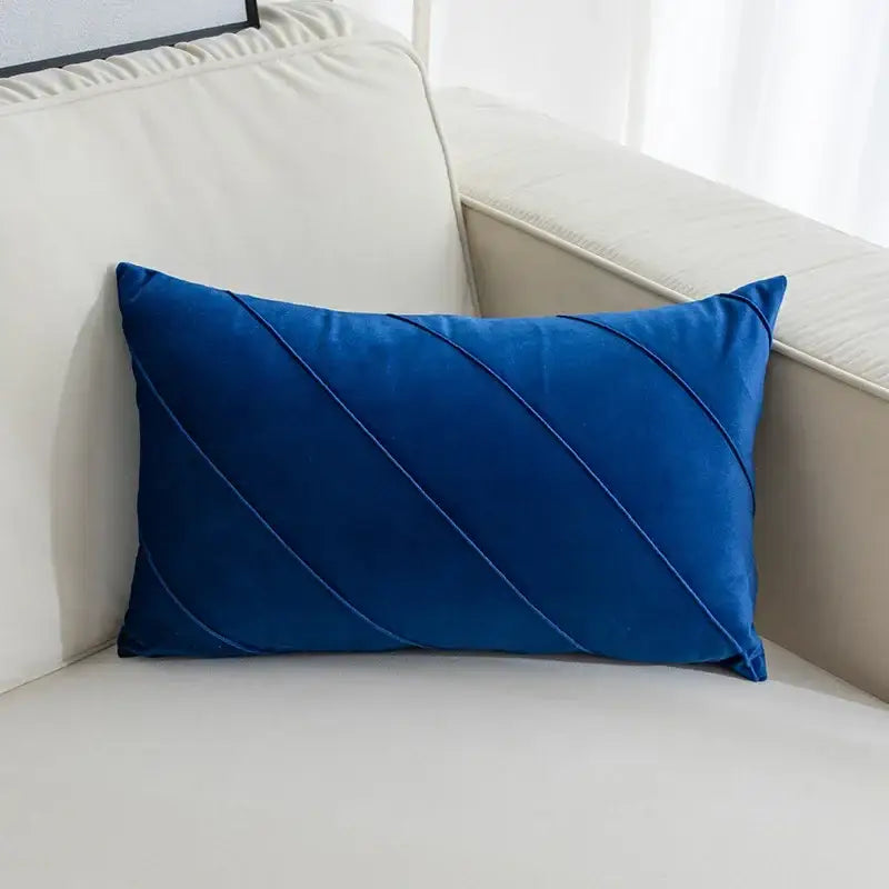 Royal blue velvet rectangular pillow with diagonal stitched accents in hand pleat embroidered cushions collection