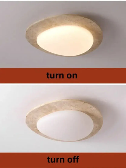 Beige speckled stone led ceiling light with oval textured concrete frame and white diffuser for bedroom decorbites led ceiling