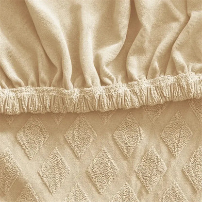 Beige textured jacquard elastic seat cover with diamond raised patterns and ruffled elastic hem for dining chair decorbites seat covers
