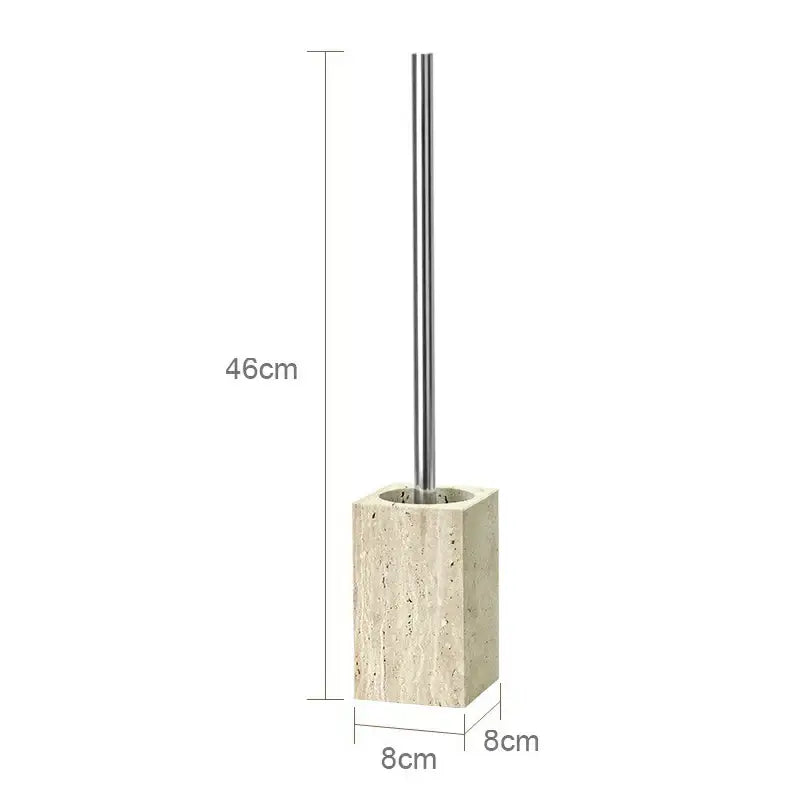 A sleek 46cm toilet brush with stainless steel handle and bristles in a beige travertine marble stone base