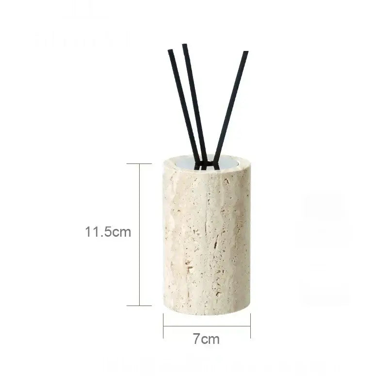 Beige travertine marble cylindrical diffuser holder with four black reed sticks from decorbites beige travertine set