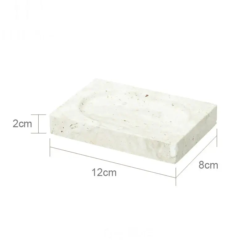 White concrete soap dish with textured surface and oval recessed area in decorbites beige travertine marble bathroom set