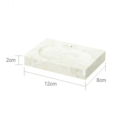 White concrete soap dish with textured surface and oval recessed area in decorbites beige travertine marble bathroom set