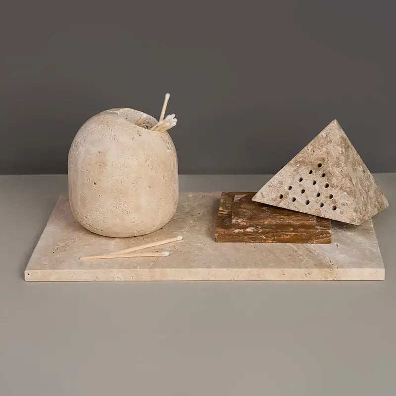 Beige travertine marble incense holder with rounded textured surface and small perforations for living room decorbites beige travertine