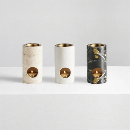 Beige travertine stone essential oil burner tray with three cylindrical gold interior candle holders for oil burner diffuser