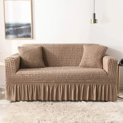 Beige waffle textured cozy sofa cover with ruffled hem solid color slipcover for living room use