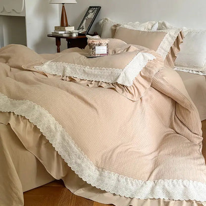Beige textured cotton bedding set with delicate white lace ruffles on duvet cover for bedroom use