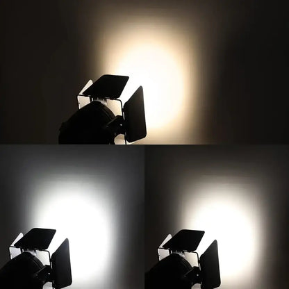 A big dipper 100w cob white stage light with adjustable barn doors emitting focused studio illumination