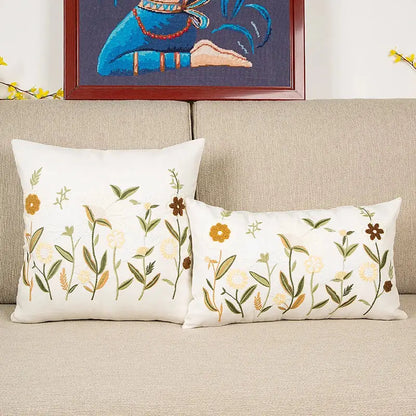 White rectangular bird embroidered cotton cushion cover with green yellow and brown floral pattern for living room decorbites
