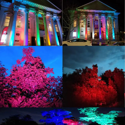 Black 24x18w rgbwa uv led wall wash with barn doors illuminating classical building with vibrant rainbow colors at night
