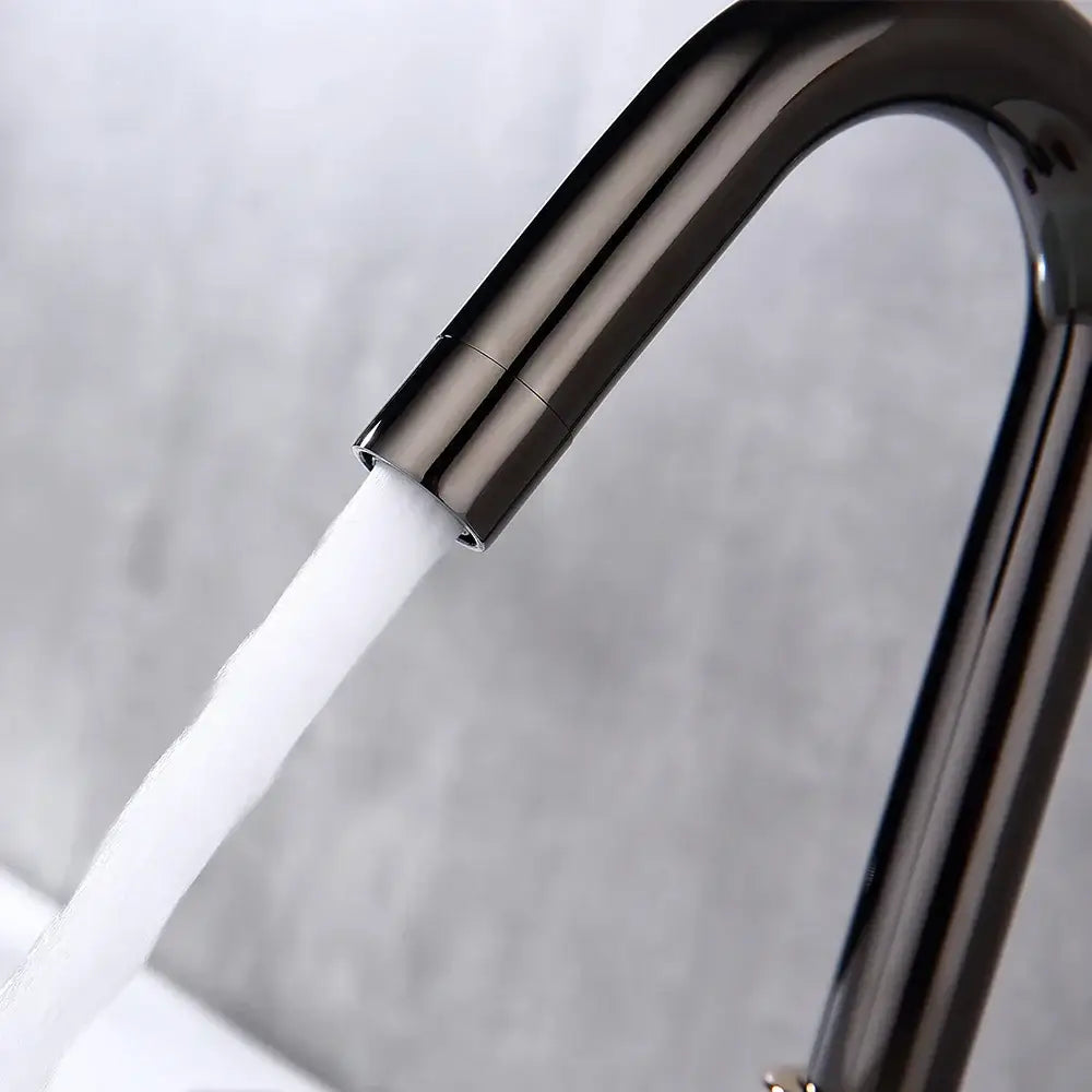 Modern matte black basin faucet with sleek curved design flowing water for decorbites gray brass basin use
