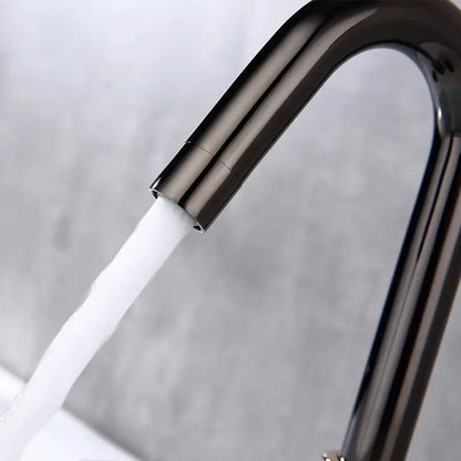 Modern matte black basin faucet with sleek curved design flowing water for decorbites gray brass basin use