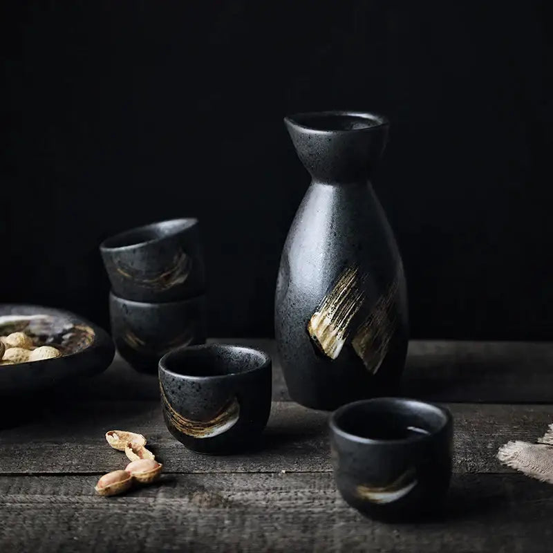 Black ceramic sake liquor dispenser set with gold brushstroke accents decorbites ceramic sake for dining room use