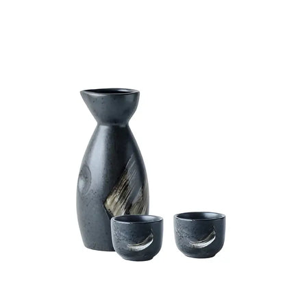 Dark gray ceramic sake liquor dispenser set with textured speckled finish and wood grain accents by decorbites ceramic sake